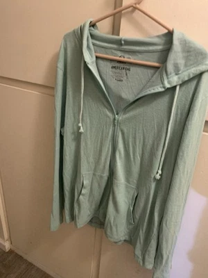 Sudadera con capucha American Rag para mujer talla XLG mangas con cremallera completa y bolsillos delanteros Foto 1 de 4