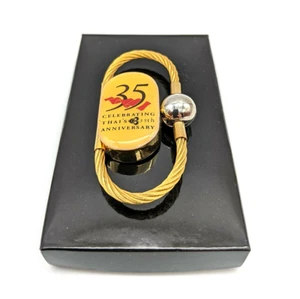 VINTAGE THAI AIRWAYS AIRLINES DUAL LOCK KEY CHAIN 35TH ANNIVERSARY RARE - Picture 1 of 8