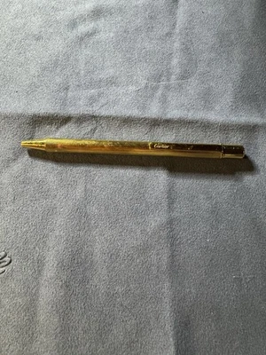 Bolígrafo enchapado en oro CARTIER Foto 1 de 4