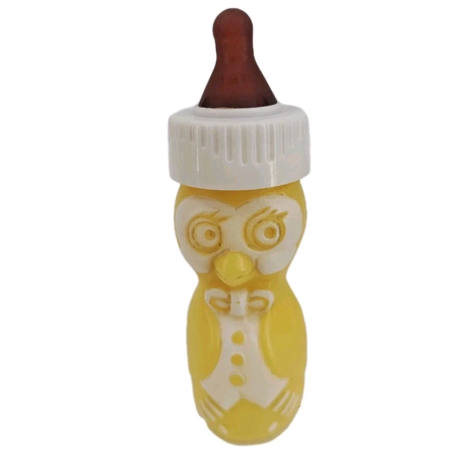 Biberón de plástico Gerber Yellow Penguin de colección de los años 70 4 oz coleccionable Foto 1 de 4