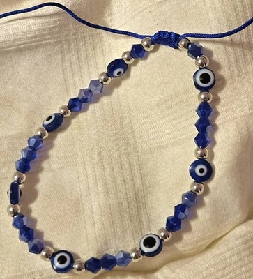 PULSERA AJUSTABLE AZUL MAL DE OJO CON 7 CUENTAS DE OJO NUDO TIRADOR ¡HECHA A MANO! ✋️¡PROTEGE! Foto 1 de 4