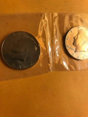 1984 P+D KENNEDY HALF UNCIRCULATED STILL IN MINT CELLO L@@K - Image 1 of 2