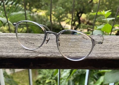 Gafas de titanio para hombre gris cristal gafas mujeres gafas ovaladas peso ligero Foto 1 de 4