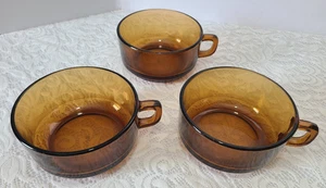 Set 3 ciotole zuppiera peperoncino vetro marrone ambra Fire King vintage con manico - Foto 1 di 17