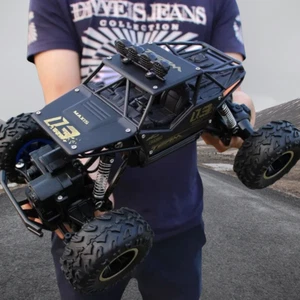 1:16 4WD RC Buggy Remote Control Car 2.4G - Auto Fuoristrada Telecomandata - Bild 1 von 7