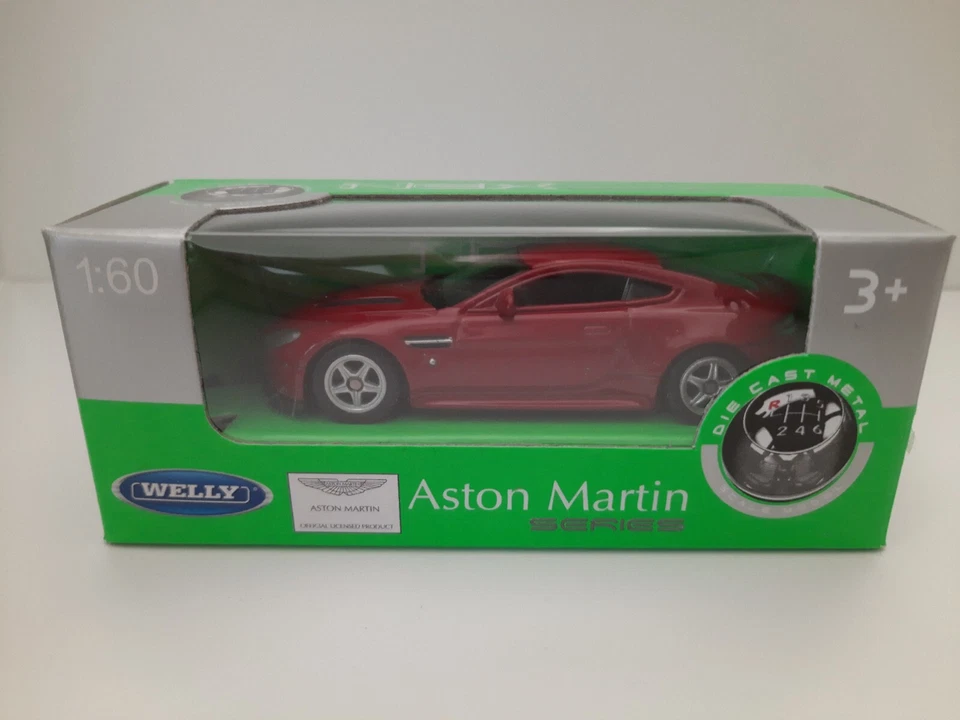 Modellino Statico Aston Martin V12 Vantage Welly Auto Colore Rosso Scala 1:64 - Immagine 1 di 1
