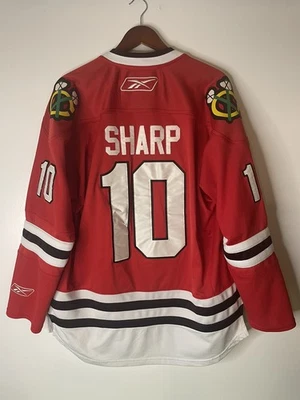 Camiseta deportiva local Patrick Sharp de los Chicago Blackhawks Reebok talla grande Foto 1 de 4