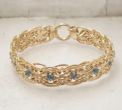 天然蓝色黄玉宝石椭圆形网球手链 14K 镀黄金银色 — 第 1/4 张图片