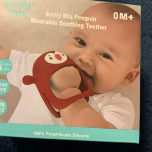 Smily Mia Penguin Wearable Soothing Infant Teether 0-6 Months Red. Lead/BPA Free - Picture 1 of 5