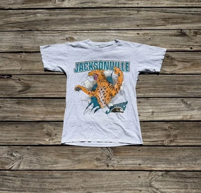 Camiseta De Colección 1993 Jacksonville Jaguars Nuez moscada Logo Prohibido Break Through Talla M Foto 1 de 4