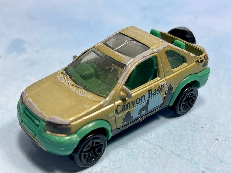Land Rover Freelander MB406 1:59 Canyon Base Gold Green Matchbox 2000 de colección Foto 1 de 1