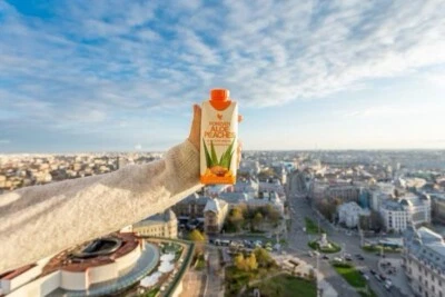 Aloe Vera Minis: Gel de melocotón, néctar de bayas y aloe vera paquetes de 12 Foto 1 de 4