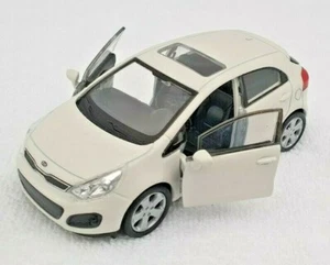 ENVÍO RÁPIDO KIA RIO crema Welly modelo coche 1:34 NUEVO & CAJA EMBALAJE ORIGINAL - Imagen 1 de 3