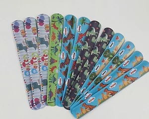 12 KLATSCHARMBÄNDER DINOSAURIER Dino Kindergeburtstag Kinder Armband Party - Imagen 1 de 1
