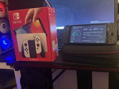 Nintendo Switch OLED-Modell HEG-001 64GB Handheld-Spielekonsole - Weiß - Bild 1 von 4