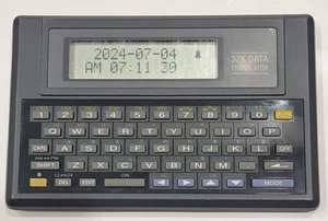 Global 32k Data Translator 6 Sprachen 10 Digit Calculator Wecker Tested - Bild 1 von 3