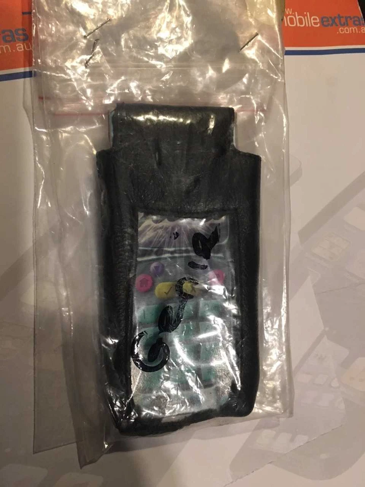 Funda de cuero Philips Genie, Genie SP Scala con clip para cinturón. Nuevo en embalaje Foto 1 de 2