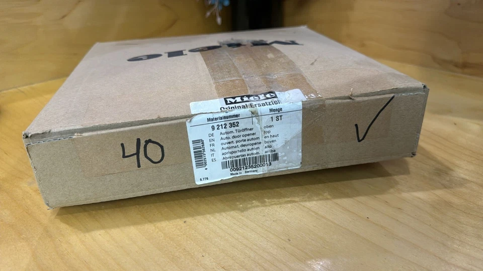 9212352 Miele New Auto. door opener top 110-127V (40) - Image 1 of 1