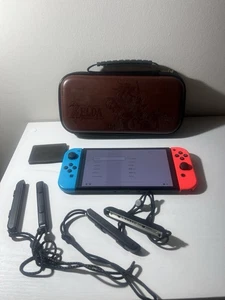 Nintendo Switch – OLED Model w/ Red & Blue Joy-Con + Zelda Carrying Case - Picture 1 of 5