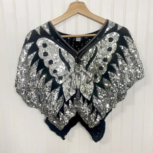 Blusa mariposa vintage años 80 negra seda plateada lentejuelas - Imagen 1 de 8