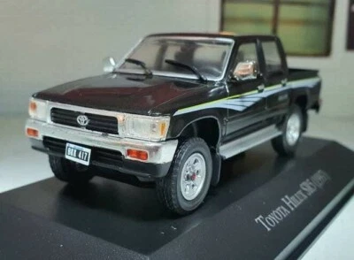 1:43 Toyota Hilux SR5 Double Cab Pickup 1997 Black Scale Model Diecast Car - Image 1 of 4