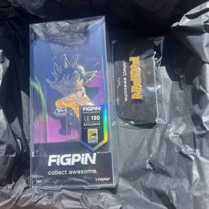 FIGPIN BRILLANTE Dragon Ball Goku Mini EXCLUSIVO Chase Le 150 W Logo EN MANO - Imagen 1 de 2