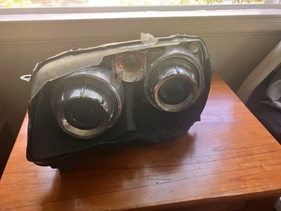 Левая галогенная фара со стороны водителя для Chrysler Crossfire 2004-2008 годов выпуска от оригинального производителя - Изображение 1 из 4