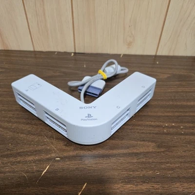 Multitap ufficiale Sony Playstation SCPH-1070 grigio OEM multitap PS1  - Immagine 1 di 4