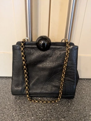 BOLSO DE MANO DE NOCHE JAEGER PEQUEÑO DE CUERO NEGRO Foto 1 de 4