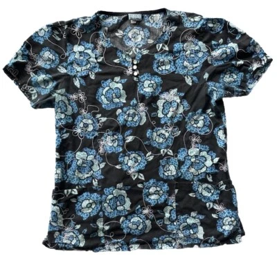 Blusa Médica Mujer White Swan Talla Mediana. Negro con patrón floral azul y blanco Foto 1 de 4