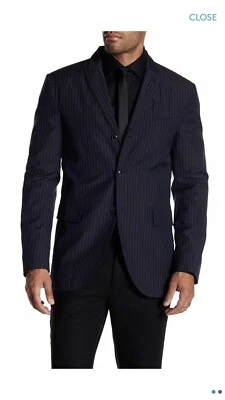 Chaqueta a rayas de lana de la colección John Varvatos. 48, US 38. $1398 Foto 1 de 4