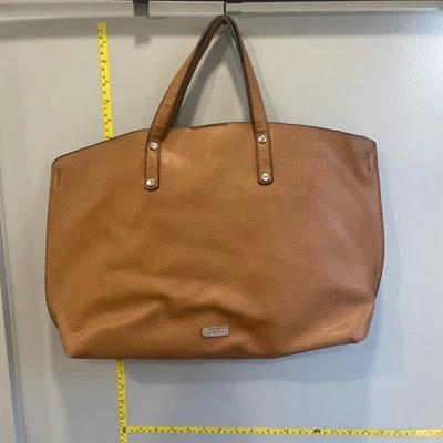 Bolso de Mano Carlos by Carlos Santana Cuero Tostado Forrado con Estampado Floral Foto 1 de 4