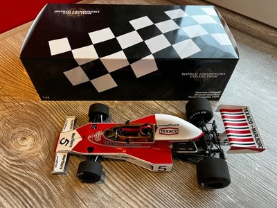 Minichamps 1:18 McLaren Ford M23 Emerson Fittipaldi 1974 World Champion Formel 1 - Bild 1 von 4