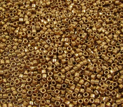 Cuentas de semillas delicadas de bronce claro metálico 11/0 Miyuki DB0022L, tubo de 5 gramos Foto 1 de 2