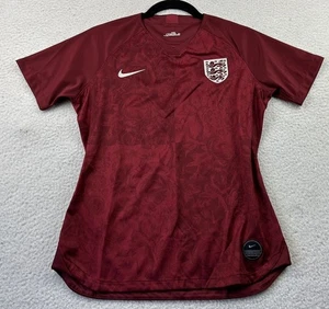 Nike Mujer Camiseta Pequeña Granate Inglaterra Leonas Camiseta Fútbol Kit 2019 - Imagen 1 de 11
