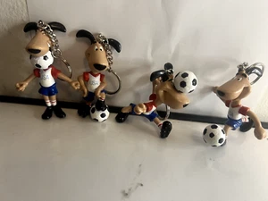 Vintage Keychain SET OF 4: WORLD CUP USA 1994 - Striker 4 poses - NOS - FIFA - Picture 1 of 14