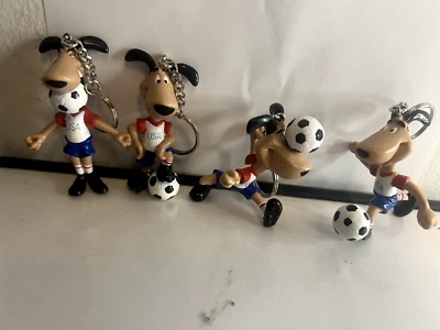 Vintage Keychain SET OF 4: WORLD CUP USA 1994 - Striker  4 poses - NOS -  FIFA - Image 1 of 4