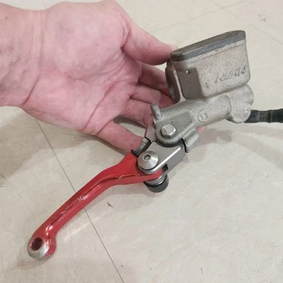 2007 - 2023 Honda CRF150R RB FRONT BRAKE MASTER CYLINDER & LEVER GENUINE OEM - Image 1 of 4