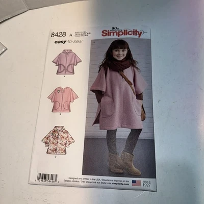 SIMPLICITY 8428 CHILD'S PONCHO IN 2 LENGTHS. UNCUT SIZE S-L  Easy to Sew - Image 1 of 4