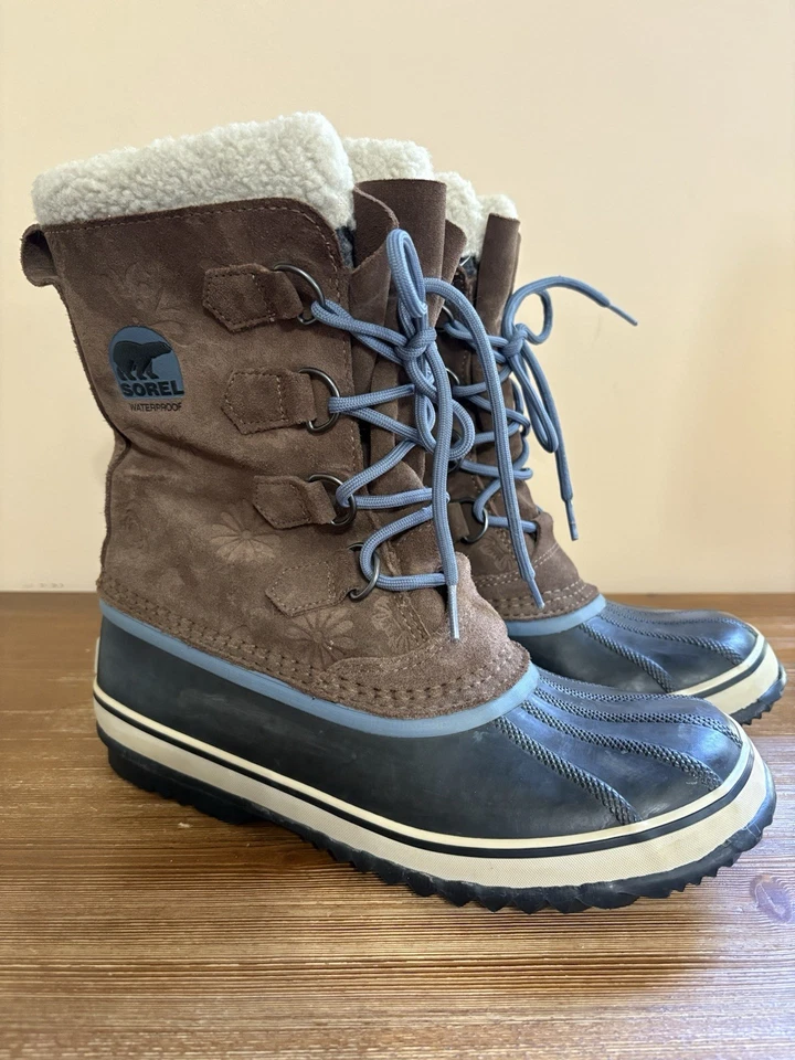 Botas de Invierno Sorel Estampado de Flores Cuero Marrón y Goma Para Mujer Talla 11 Aisladas Foto 1 de 4