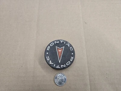 Tapa antipolvo cubo central Pontiac OEM 1997-2009 Aztek Bonneville Grand Am Prix 9593169 Foto 1 de 4