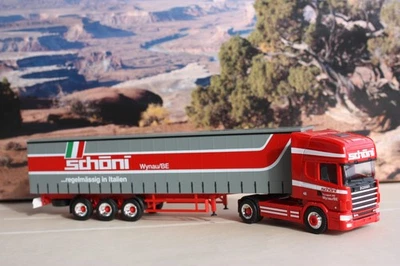 Herpa 240314 Scania 144 TL Gardinenplanensattelzug "Schöni" - Neu in OVP - Bild 1 von 3