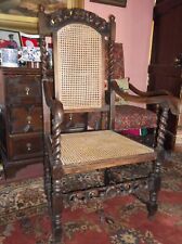 oak Jacobean style arm chair with rattan back and seat