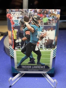 Panini Chronicles #401 2021 Trevor Lawrence actualización de puntuación novatos plateado - Imagen 1 de 2