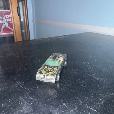 Pontiac Firebird vintage 1977 Hot Wheels Hot Bird transmisión automática paredes negras Hong Kong Foto 1 de 3