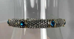 PLATA CON DETALLES DORADOS Y PIEDRAS DE COLOR TOPACIO AZUL. PULSERA 7 PIEDRAS - Imagen 1 de 3