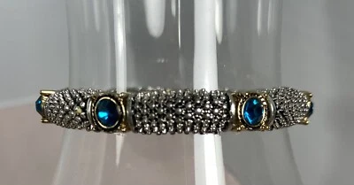 SILVER WITH GOLD ACCENTS & BLUE TOPAZ COLORED STONES. 7 STONES ON BRACELET - Imagem 1 de 3