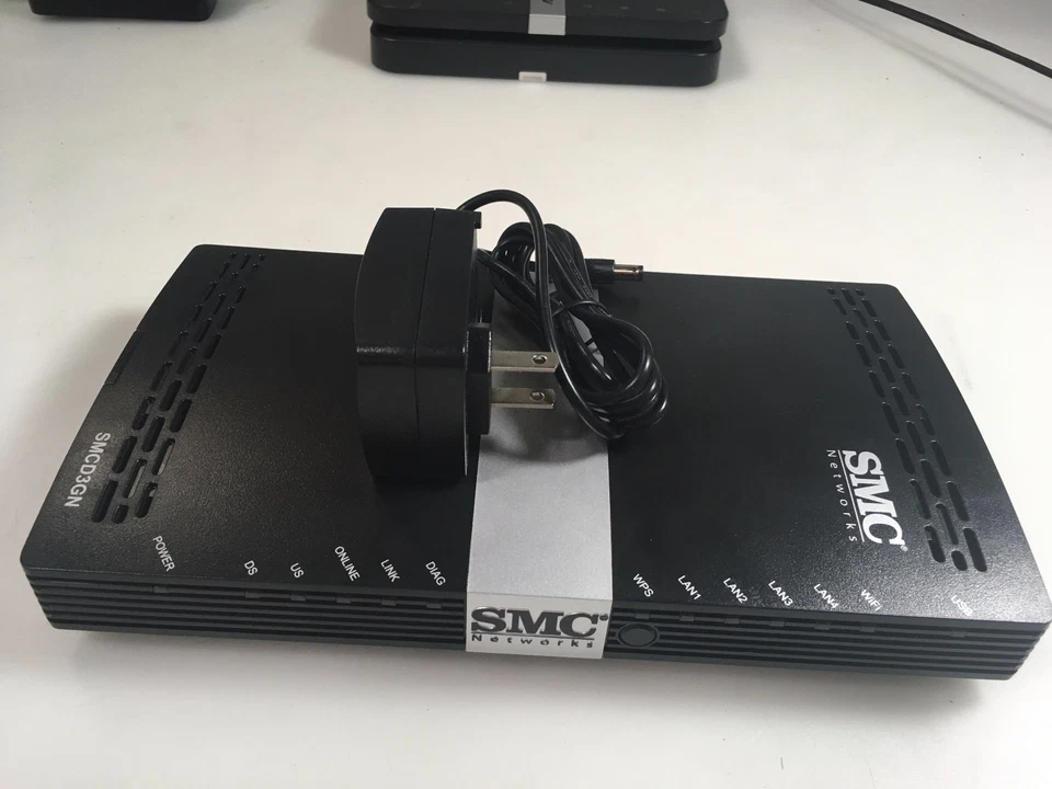 SMC SMCD3GN-RES DOCSIS 3.0 4-Port Gigabit Ethernet Wi-Fi Cable Modem w/ Adapter - Image 1 of 4