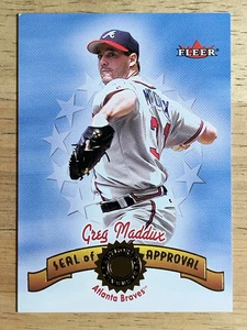 2001 Fleer Authority Seal of Approval #9 Greg Maddux (NM) - Picture 1 of 2