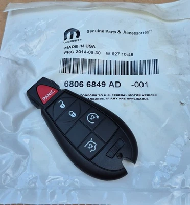 2008-2010 Jeep Grand Cherokee Commander NEW Genuine MoPar Remote KEY FOB - Image 1 of 2